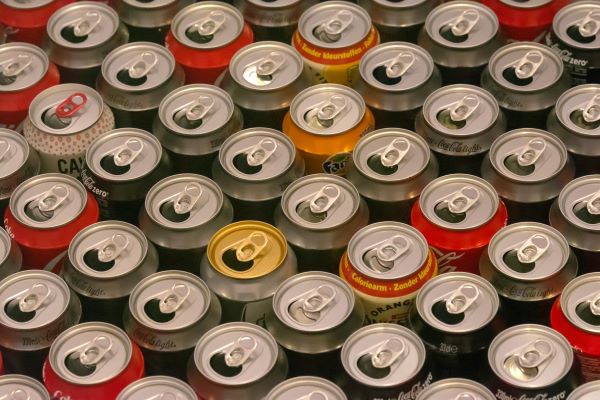 rows of empty aluminium cans ready to be recycled